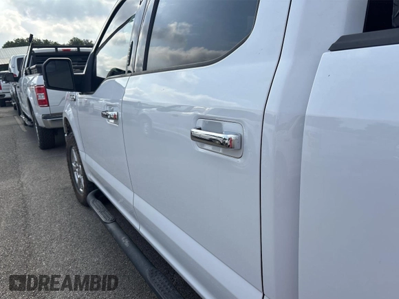 2019 Ford F-150 XL with VIN 1FTFW1E42KKF27037, listed as a IAAI auction lot 42777832 with 169,179 mi miles and . Bid and sale history available at DreamBid. Image 2.