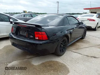2003 Ford Mustang GT Deluxe with VIN 1FAFP42X33F398982, listed as a IAAI auction lot 42111539 with 80,051 mi miles. Bid and sale history available at carsss.com. Image 4.