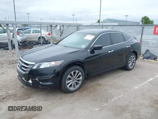 2010 Honda Crosstour EX z VIN 5J6TF1H31AL000843, wystawiony jako IAAI lot #42289093 z przebiegiem 182 517 mil mil oraz . Historia ofert i sprzedaży dostępna na DreamBid. Obrazek 2.