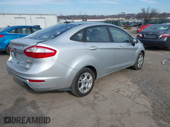 2014 Ford Fiesta SE with VIN 3FADP4BJXEM150573, listed as a IAAI auction lot 41598139 with Not Provided miles. Bid and sale history available at carsss.com. Image 4.