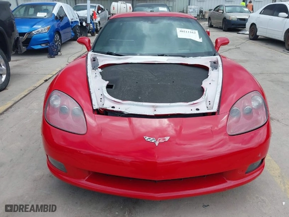 2005 Chevrolet Corvette with VIN 1G1YY24UX55116202, listed as a IAAI auction lot 40211162 with 55,579 mi miles. Bid and sale history available at carsss.com. Image 12.