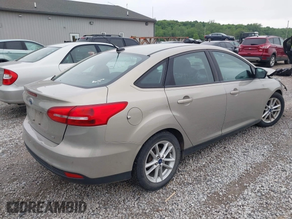2016 Ford Focus SE z VIN 1FADP3F26GL368544, wystawiony jako IAAI lot #42322376 z przebiegiem 120 535 mil mil oraz . Historia ofert i sprzedaży dostępna na DreamBid. Obrazek 4.