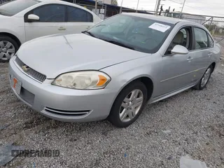 2013 Chevrolet Impala LT with VIN 2G1WG5E34D1251791, listed as a IAAI auction lot 41948414 with 195,204 mi miles and . Bid and sale history available at DreamBid. Image 2.
