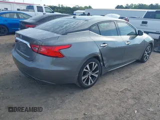 2016 Nissan Maxima SL with VIN 1N4AA6AP8GC430051, listed as a IAAI auction lot 41983059 with 166,786 mi miles and . Bid and sale history available at DreamBid. Image 4.