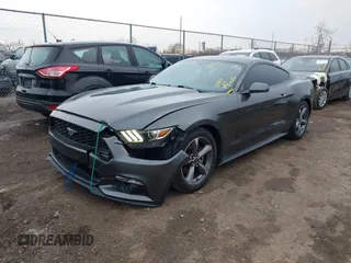 2016 Ford Mustang V6 with VIN 1FA6P8AM5G5337594, listed as a IAAI auction lot 41864037 with 128,117 mi miles and . Bid and sale history available at carsss.com. Image 17.