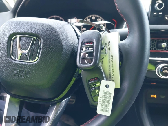 2022 Honda Civic Si with VIN 2HGFE1E52NH474042, listed as a IAAI auction lot 42099415 with 26,828 mi miles and . Bid and sale history available at DreamBid. Image 11.