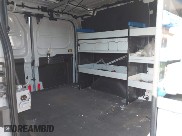 2016 Ford Transit Cargo with VIN 1FTYR1YM9GKB55554, listed as a IAAI auction lot 41850417 with 69,562 mi miles and . Bid and sale history available at DreamBid. Image 8.