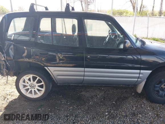 2000 Toyota RAV4 with VIN JT3GP10V5Y7073965, listed as a IAAI auction lot 42013237 with 284,594 mi miles and . Bid and sale history available at DreamBid. Image 13.