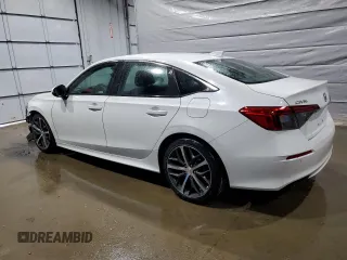 2022 Honda Civic Touring z VIN 2HGFE1F91NH313585, wystawiony jako Copart lot #56042115 z przebiegiem 30 954 mil mil oraz Szkoda całkowita • Salvage title. Historia ofert i sprzedaży dostępna na DreamBid. Obrazek 2.