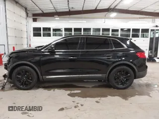 2016 Lincoln MKX Premiere with VIN 2LMTJ6JR4GBL75053, listed as a IAAI auction lot 41020450 with 120,930 mi miles. Bid and sale history available at carsss.com. Image 14.