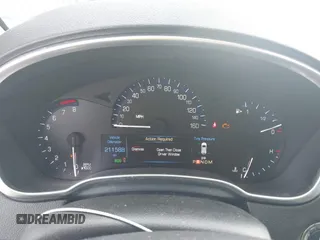 2014 Cadillac SRX z VIN 3GYFNAE35ES652370, wystawiony jako IAAI lot #40984924 z przebiegiem 211 588 mil mil oraz . Historia ofert i sprzedaży dostępna na DreamBid. Obrazek 7.