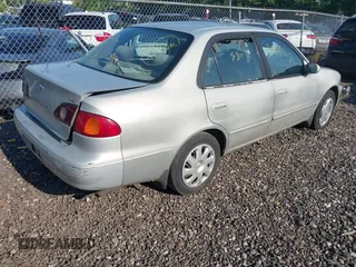 2001 Toyota Corolla CE with VIN 2T1BR12E61C473602, listed as a IAAI auction lot 42408733 with Not provided miles and . Bid and sale history available at DreamBid. Image 4.