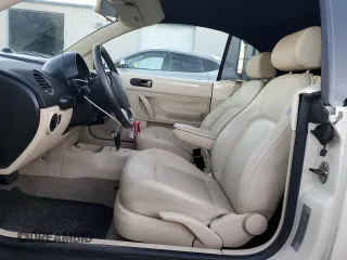 2009 Volkswagen Beetle S with VIN 3VWRF31Y29M409328, listed as a Copart auction lot 87849455 with 69,693 mi miles and Salvage title. Bid and sale history available at DreamBid. Image 7.
