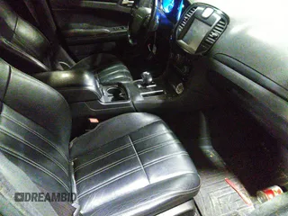 2014 Chrysler 300 S with VIN 2C3CCABG2EH343503, listed as a IAAI auction lot 40934463 with 128,876 mi miles and . Bid and sale history available at carsss.com. Image 5.