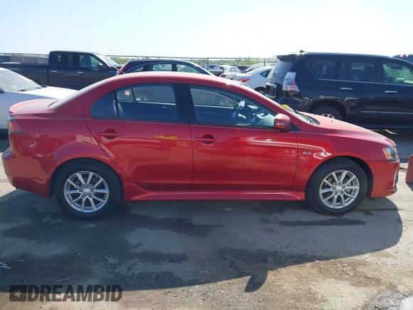 2016 Mitsubishi Lancer ES z VIN JA32U2FU3GU001857, wystawiony jako IAAI lot #41999674 z przebiegiem 65 520 mil mil oraz . Historia ofert i sprzedaży dostępna na DreamBid. Obrazek 13.