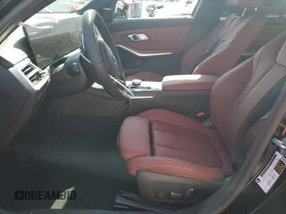 2025 BMW 3 Series 330i with VIN 3MW69CW05S8F12058, listed as a Copart auction lot 88821005 with 2,733 mi miles and Salvage Title. Bid and sale history available at carsss.com. Image 7.