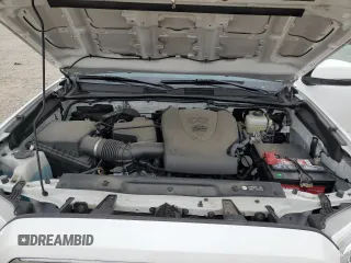 2019 Toyota Tacoma SR z VIN 3TMCZ5AN1KM190613, wystawiony jako Copart lot #57983795 z przebiegiem 41 627 mil mil oraz Szkoda całkowita • Salvage title. Historia ofert i sprzedaży dostępna na DreamBid. Obrazek 11.