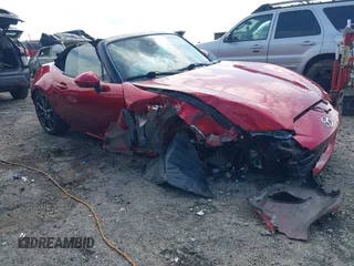 2019 Mazda MX-5 Miata Grand Touring z VIN JM1NDAD7XK0306505, wystawiony jako IAAI lot #42092642 z przebiegiem 111 967 mil mil oraz . Historia ofert i sprzedaży dostępna na DreamBid. Obrazek 1.