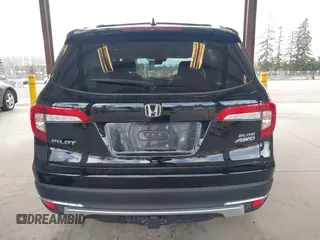 2021 Honda Pilot Elite with VIN 5FNYF6H04MB043014, listed as a IAAI auction lot 41826931 with 63,546 mi miles and . Bid and sale history available at DreamBid. Image 16.