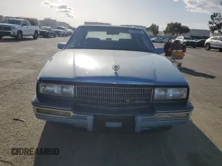 1988 Cadillac Seville z VIN 1G6KS5152JU809989, wystawiony jako Copart lot #51385205 z przebiegiem 40 217 mil mil oraz Czysty tytuł • Clean title. Historia ofert i sprzedaży dostępna na DreamBid. Obrazek 5.