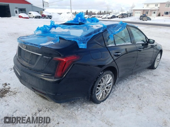 2022 Cadillac CT5 Premium Luxury z VIN 1G6DT5RK5N0135897, wystawiony jako Copart lot #82653464 z przebiegiem 71 654 mil mil oraz Szkoda całkowita • Salvage title. Historia ofert i sprzedaży dostępna na DreamBid. Obrazek 3.