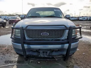 2000 Ford F-150 XL с VIN 1FTRX17L6YKB45245, выставлен на аукционе Copart как лот 62365195 с пробегом 306 210 миль миль и Списание • Salvage title. История ставок и продаж доступна на DreamBid. Изображение 5.