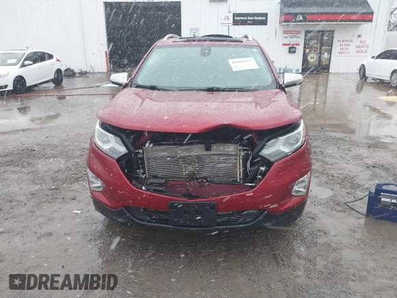 2018 Chevrolet Equinox Premier with VIN 2GNAXVEVXJ6115268, listed as a IAAI auction lot 40881577 with 61,910 mi miles and . Bid and sale history available at DreamBid. Image 6.