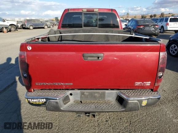 2005 GMC Canyon SLE Z85 with VIN 1GTCS196858146188, listed as a Copart auction lot 73087244 with 213,815 mi miles and Salvage Title. Bid and sale history available at carsss.com. Image 6.