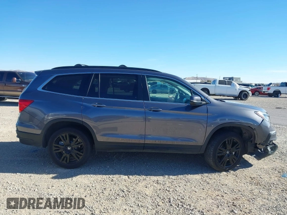2022 Honda Pilot Special Edition with VIN 5FNYF5H27NB013972, listed as a IAAI auction lot 41219766 with 52,291 mi miles and . Bid and sale history available at carsss.com. Image 13.