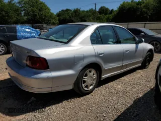 2003 Mitsubishi Galant ES z VIN 4A3AA46G73E065851, wystawiony jako Copart lot #66800814 z przebiegiem 55 837 mil mil oraz Szkody całkowita. Historia ofert i sprzedaży dostępna na DreamBid. Obrazek 3.