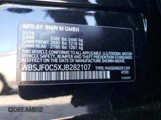 2018 BMW M5 z VIN WBSJF0C5XJB282107, wystawiony jako Copart lot #49979943 z przebiegiem 55 243 mil mil oraz . Historia ofert i sprzedaży dostępna na DreamBid. Obrazek 12.