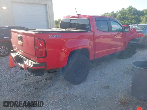 2020 Chevrolet Colorado 4WD Z71 with VIN 1GCGTDEN6L1215253, listed as a IAAI auction lot 42343032 with 61,632 mi miles and . Bid and sale history available at DreamBid. Image 4.