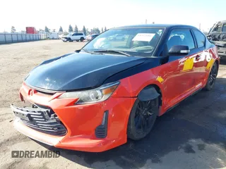 2015 Scion tC with VIN JTKJF5C71FJ006863, listed as a IAAI auction lot 41332681 with 91,559 mi miles. Bid and sale history available at carsss.com. Image 21.