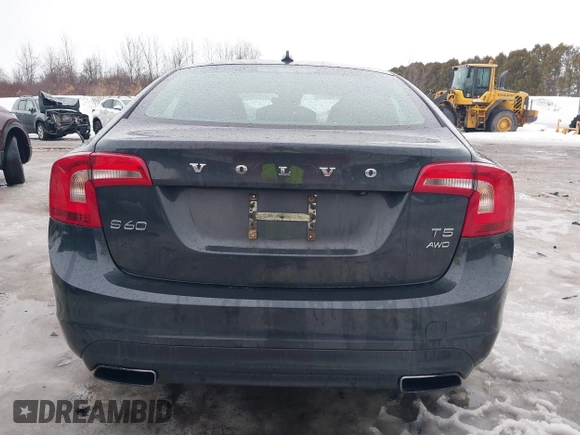 2015 Volvo S60 T5 Premier z VIN YV1612TK3F1359338, wystawiony jako IAAI lot #41645209 z przebiegiem 106 822 mil mil oraz . Historia ofert i sprzedaży dostępna na DreamBid. Obrazek 16.
