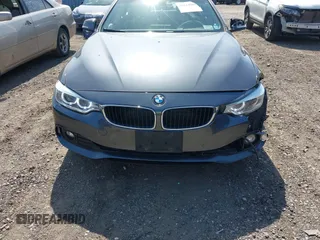 2015 BMW 4 Series 428i xDrive with VIN WBA4C9C55FD331921, listed as a IAAI auction lot 42214901 with 94,970 mi miles and . Bid and sale history available at DreamBid. Image 13.