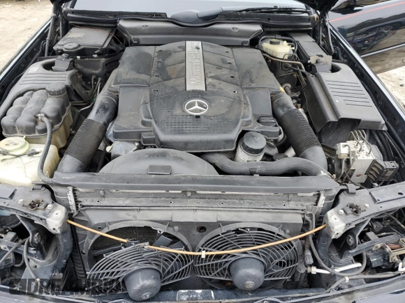 1999 Mercedes-Benz SL-Class with VIN WDBFA68F0XF184008, listed as a Copart auction lot 84998014 with 74,809 mi miles and Salvage Title. Bid and sale history available at carsss.com. Image 11.