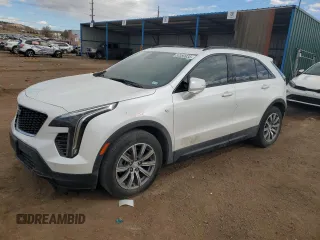 2022 Cadillac XT4 FWD Sport z VIN 1GYFZER47NF165920, wystawiony jako Copart lot #50389935 z przebiegiem 57 410 mil mil oraz Szkoda całkowita • Salvage title. Historia ofert i sprzedaży dostępna na DreamBid. Obrazek 1.