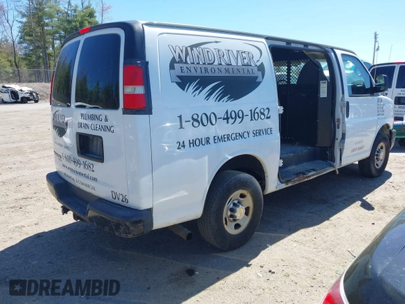 2014 Chevrolet Express Cargo Van with VIN 1GCWGFCA3E1130871, listed as a IAAI auction lot 42166083 with 279,624 mi miles. Bid and sale history available at carsss.com. Image 4.