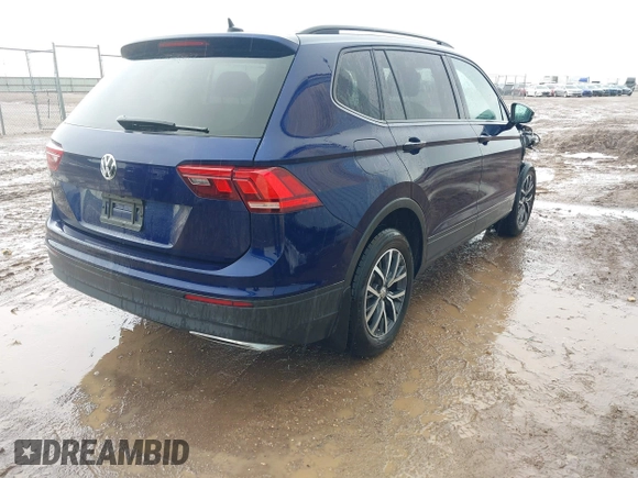 2021 Volkswagen Tiguan S with VIN 3VV1B7AXXMM002930, listed as a IAAI auction lot 42169613 with 47,118 mi miles and . Bid and sale history available at DreamBid. Image 4.