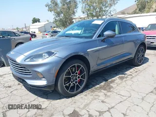 2021 Aston Martin DBX z VIN SCFVUJAW8MTV02568, wystawiony jako IAAI lot #42183964 z przebiegiem 53 608 mil mil oraz . Historia ofert i sprzedaży dostępna na DreamBid. Obrazek 17.