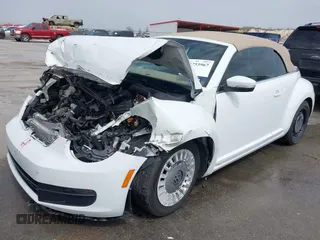 2015 Volkswagen Beetle 1.8T w/Tech with VIN 3VW517AT4FM812294, listed as a IAAI auction lot 41753967 with 59,857 mi miles and . Bid and sale history available at DreamBid. Image 17.