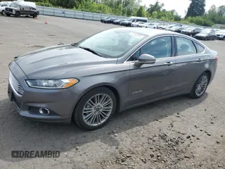 2014 Ford Fusion SE Hybrid с VIN 3FA6P0LU1ER122724, выставлен на аукционе Copart как лот 59182695 с пробегом 143 798 миль миль и Списание • Salvage title. История ставок и продаж доступна на DreamBid. Изображение 1.