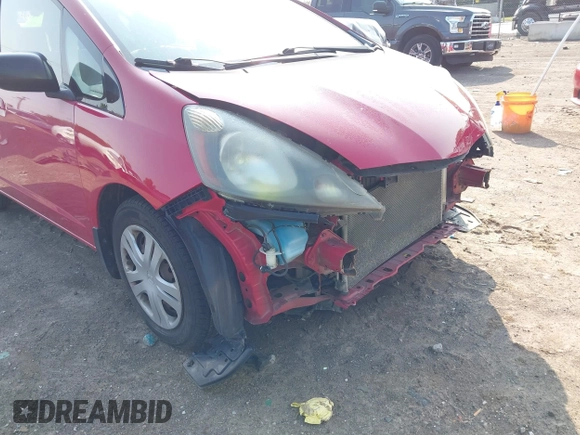 2009 Honda Fit z VIN JHMGE88219S023503, wystawiony jako IAAI lot #42376165 z przebiegiem 142 166 mil mil oraz . Historia ofert i sprzedaży dostępna na DreamBid. Obrazek 18.