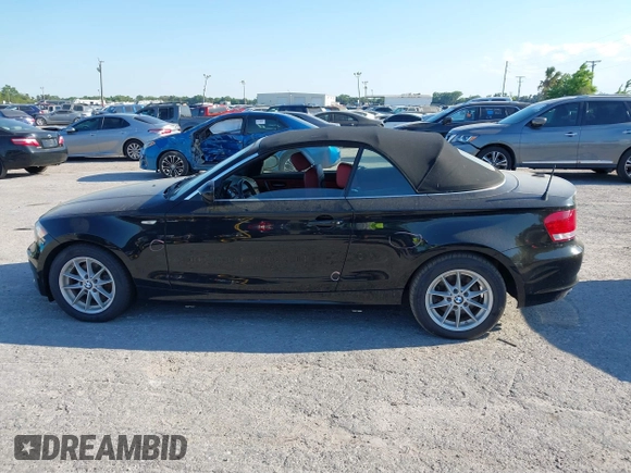 2011 BMW 1 Series 128i with VIN WBAUL7C55BVM81049, listed as a IAAI auction lot 41892811 with 50,659 mi miles and . Bid and sale history available at carsss.com. Image 15.