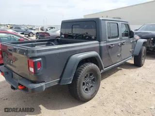 2022 Jeep Gladiator Mojave with VIN 1C6JJTEG5NL125968, listed as a IAAI auction lot 41654201 with 76,294 mi miles. Bid and sale history available at carsss.com. Image 4.