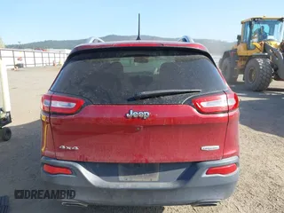 2016 Jeep Cherokee Latitude with VIN 1C4PJMCS8GW250318, listed as a IAAI auction lot 42126241 with 105,028 mi miles. Bid and sale history available at carsss.com. Image 17.