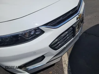 2018 Chevrolet Malibu LT z VIN 1G1ZD5ST5JF160799, wystawiony jako IAAI lot #42304849 z przebiegiem 22 983 mil mil oraz . Historia ofert i sprzedaży dostępna na DreamBid. Obrazek 1.