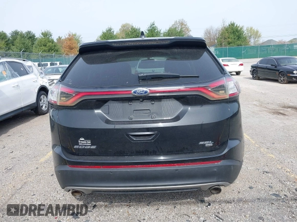 2015 Ford Edge SEL with VIN 2FMTK4J88FBB05259, listed as a IAAI auction lot 42043247 with 128,987 mi miles. Bid and sale history available at carsss.com. Image 16.
