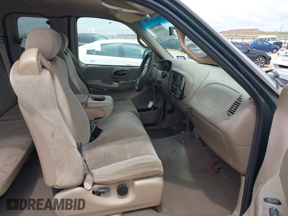 2001 Ford F-150 XL with VIN 1FTZX07271KB88709, listed as a IAAI auction lot 42599181 with 153,985 mi miles and . Bid and sale history available at DreamBid. Image 5.