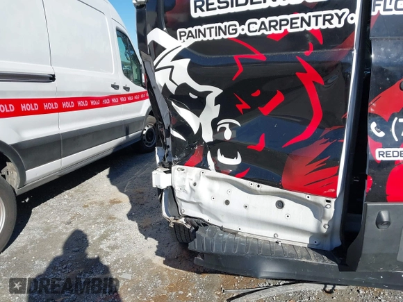 2022 Ford Transit Cargo with VIN 1FTBR2Y84NKA64395, listed as a IAAI auction lot 41359067 with 59,393 mi miles and . Bid and sale history available at DreamBid. Image 6.